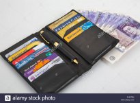 black-wallet-with-assortment-of-credit-cards-visa-and-american-express-EHNT5N-1.jpg
